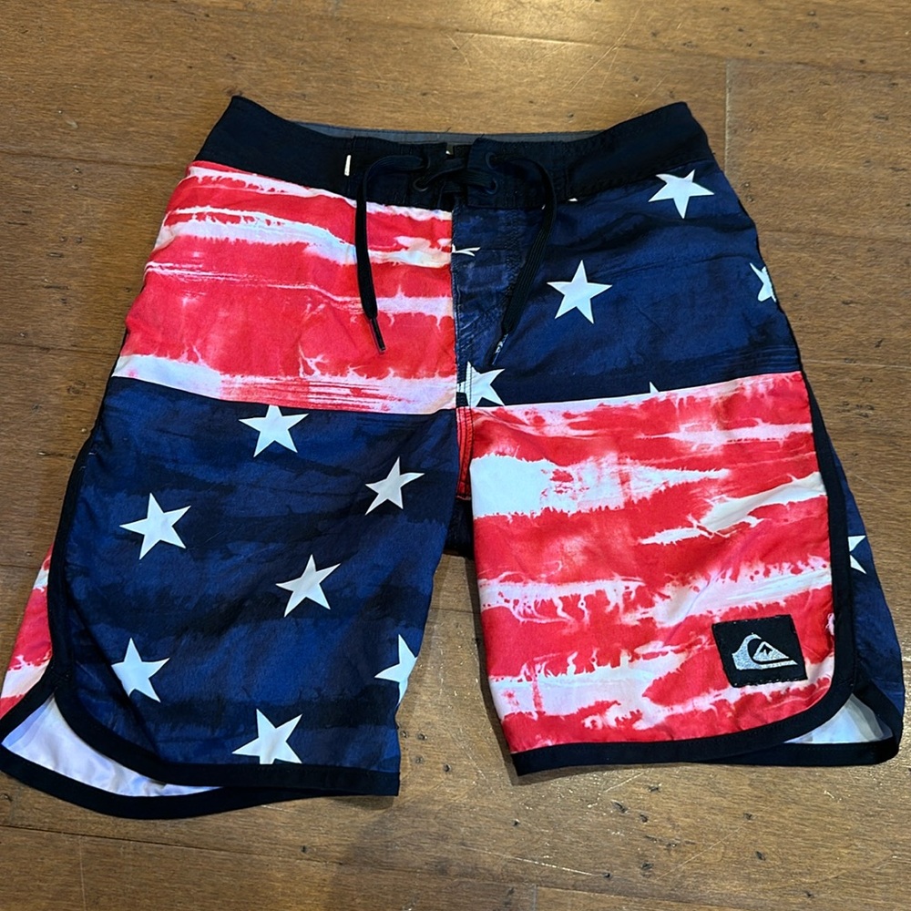 Stars and Stripes swim trunks (size 23/8 yr)